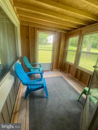 a room with furniture and a window