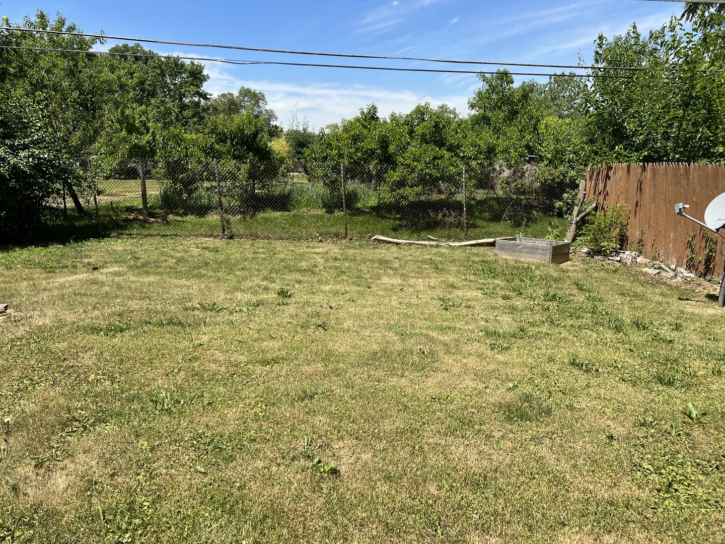 1013 Deephaven Drive Joliet, IL 60432 - Photo 17 of 17 a view of a yard with an outdoor space