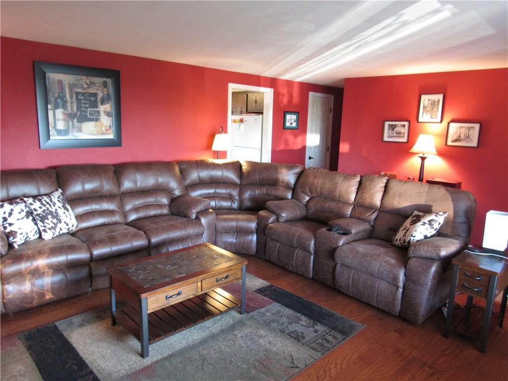 321 Madison Heights Road New Stanton, PA 15672 - Photo 2 of 24 Living room with new engineered hardwood flooring through out.