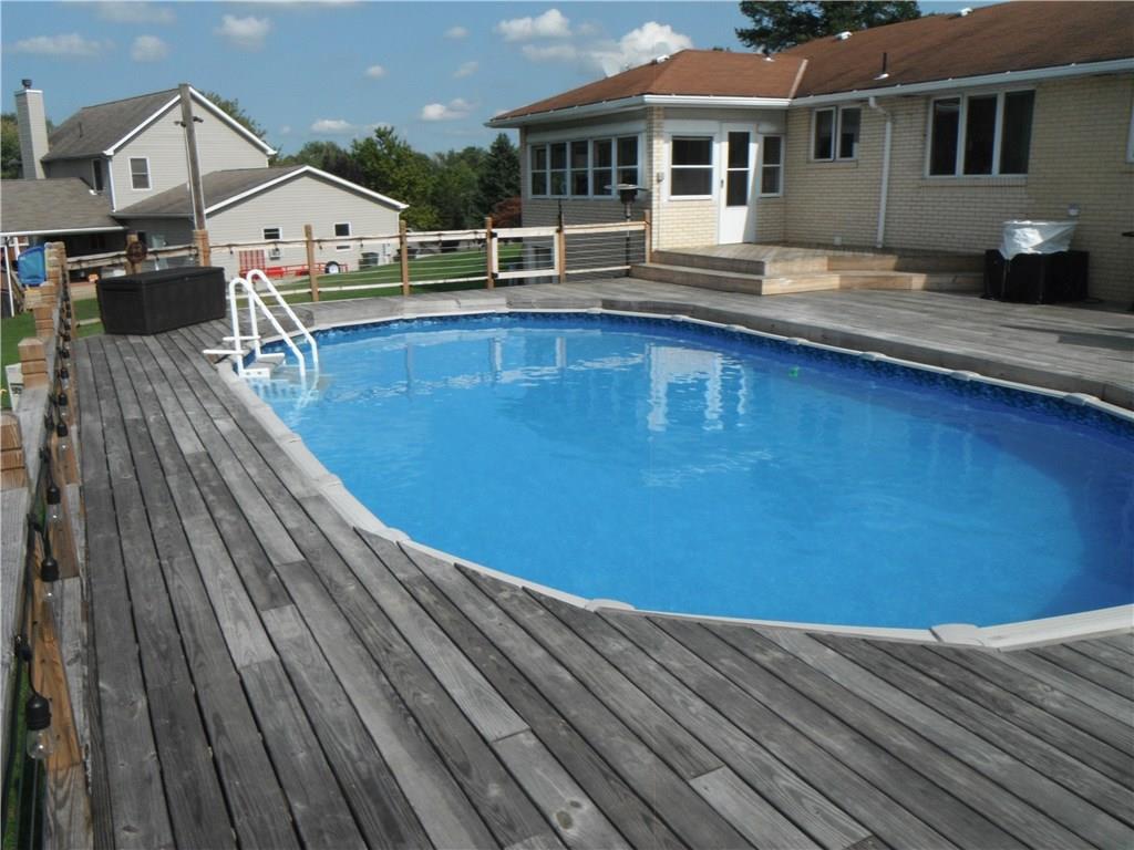 321 Madison Heights Road New Stanton, PA 15672 - Photo 24 of 24 view of enclosed back porch that leads to pool with great deck!!