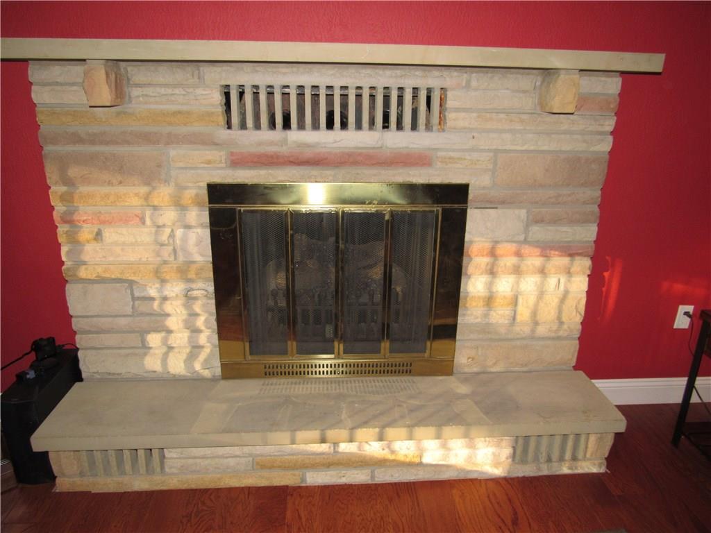321 Madison Heights Road New Stanton, PA 15672 - Photo 4 of 24 thermostatically controlled gas fire place with stone surround
