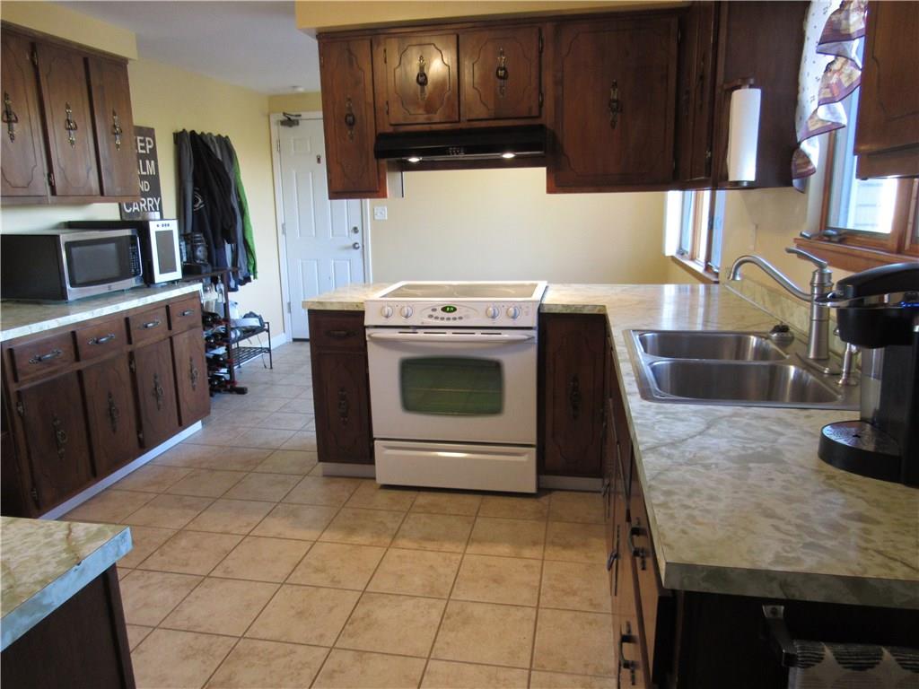 321 Madison Heights Road New Stanton, PA 15672 - Photo 9 of 24 kitchen with lots of counter space to prepare food and cabinets galore!