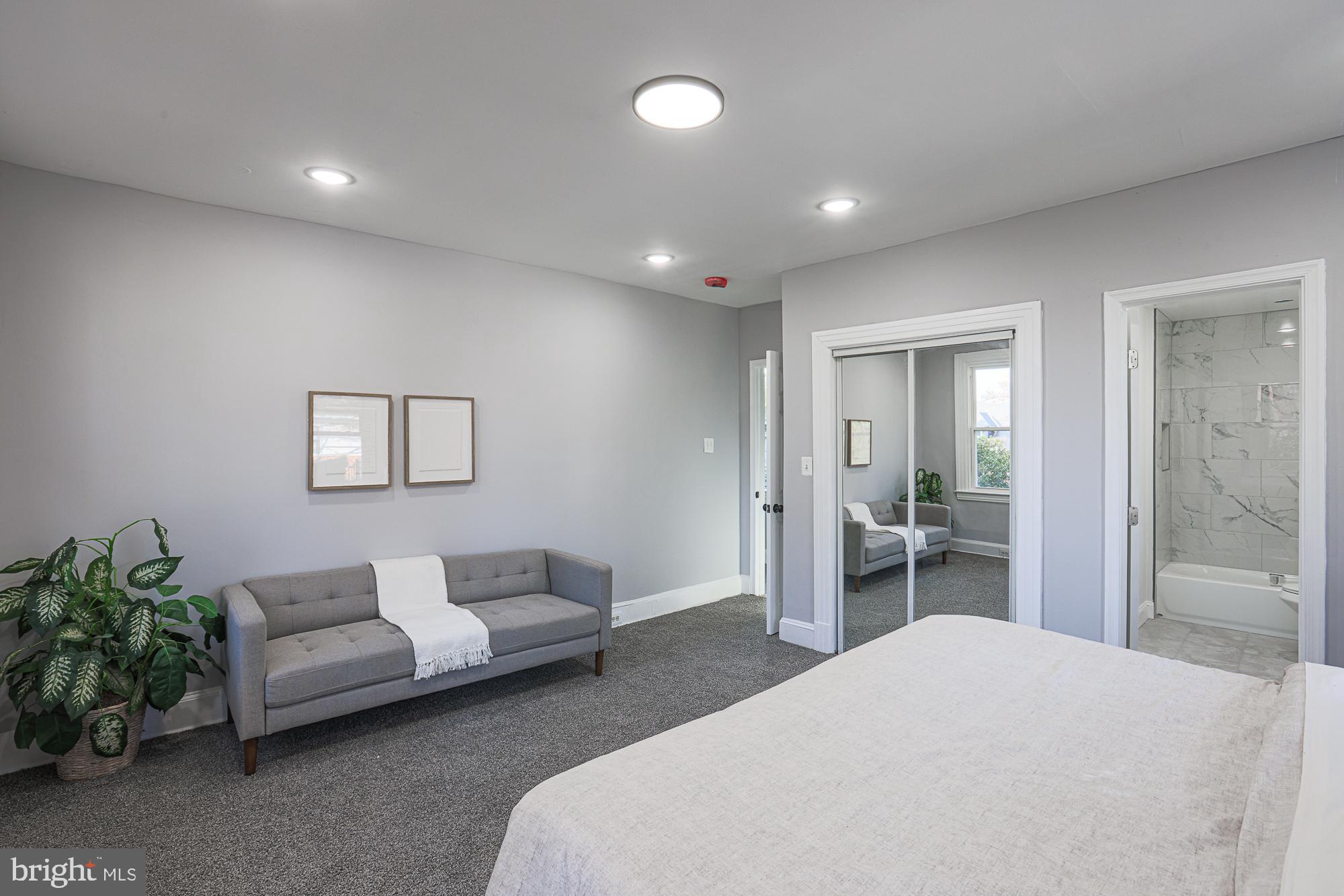 2606 Queen Anne Road Baltimore, MD 21216 - Photo 66 of 92 Spacious bedroom with modern elegance.