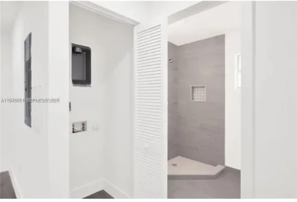 a view of a backyard with pathway