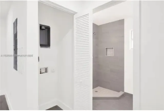 a view of a backyard with pathway