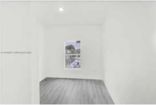 an empty room with window