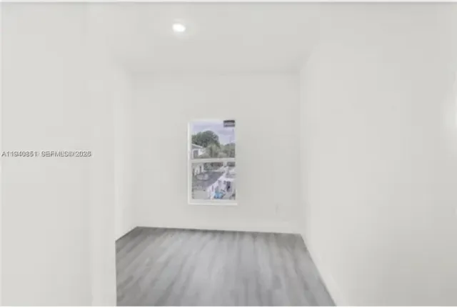 an empty room with window