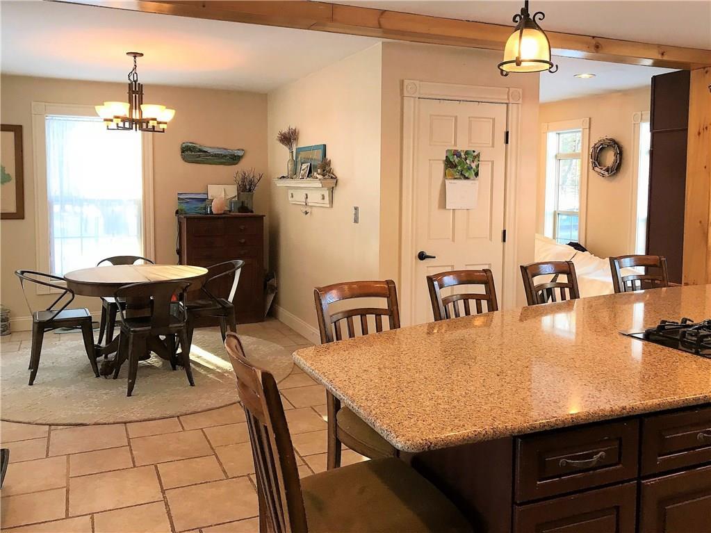 562 Springy Pond Road Ellsworth, ME 04605 - Photo 13 of 33 Open kitchen and dining space can...