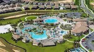 an aerial view of a house with a garden