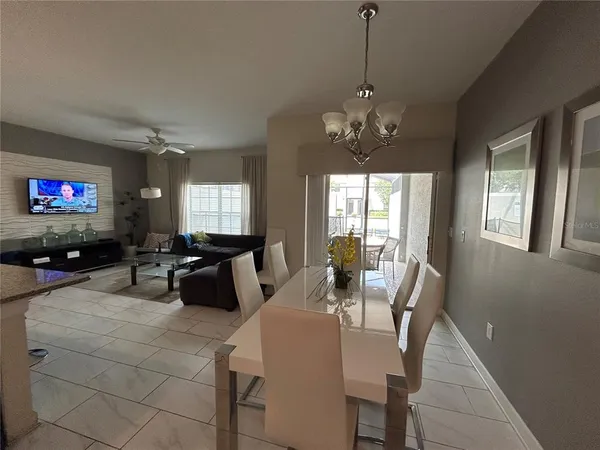 a view of a livingroom with furniture and window