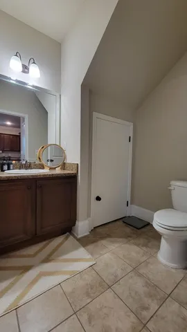 a kitchen with a sink and a stove