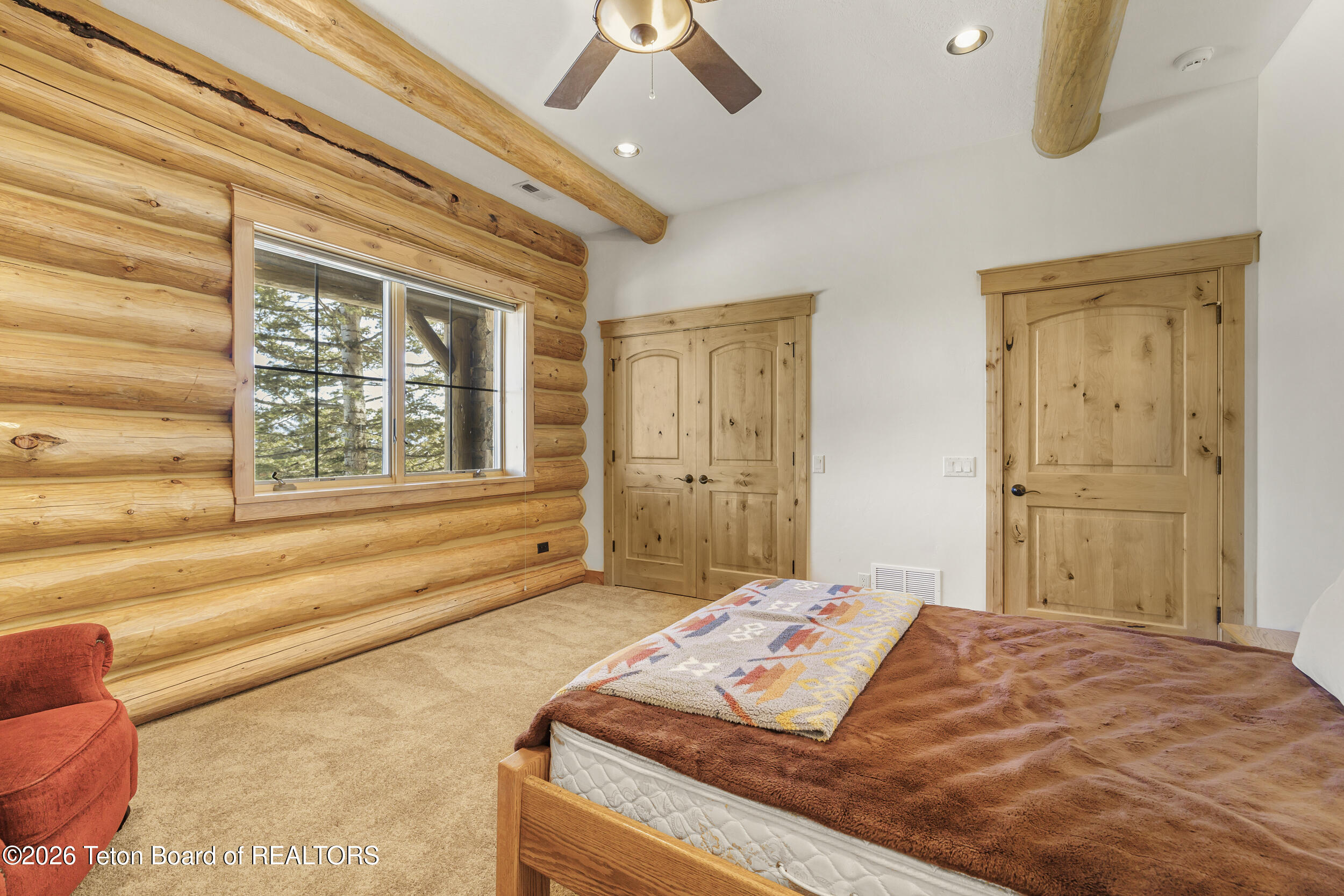 8157 Ripplinger Road Driggs, ID 83422 - Photo 30 of 44 Lower Level Bedroom 2