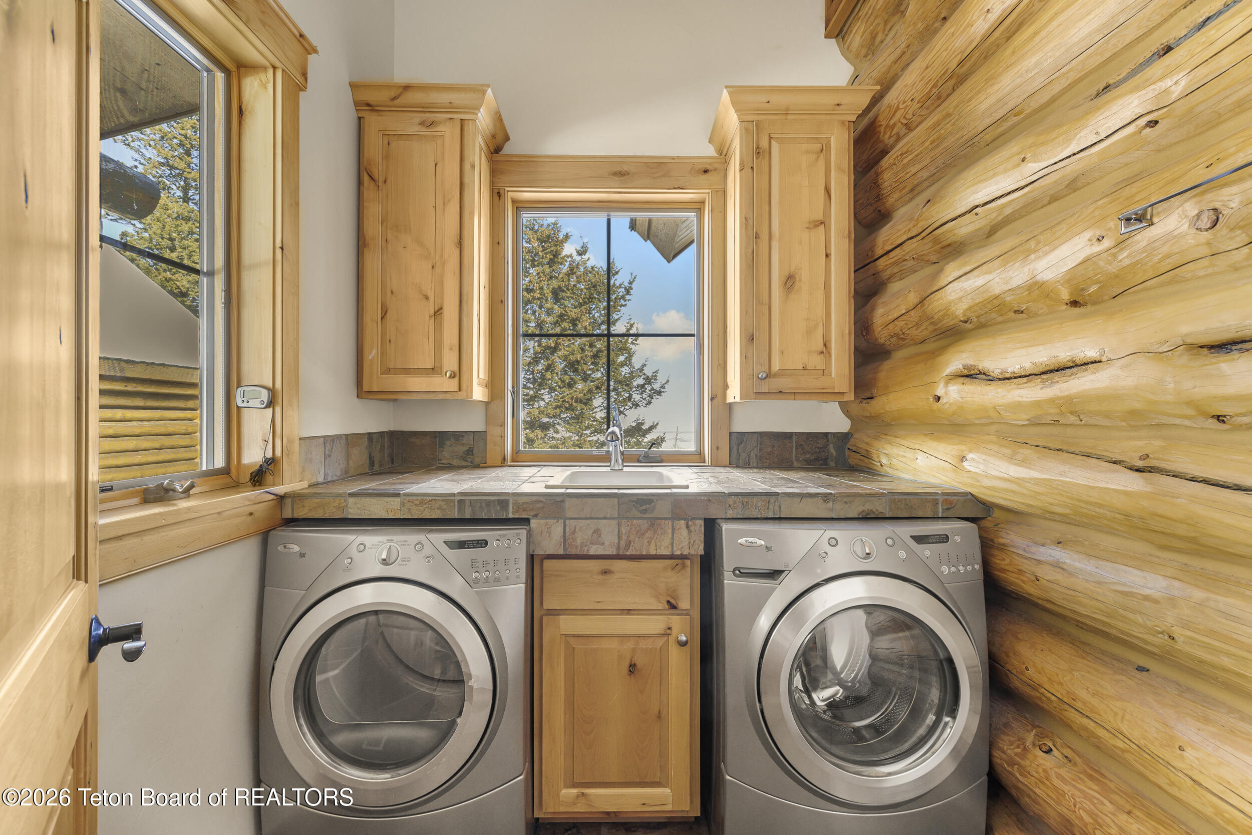 8157 Ripplinger Road Driggs, ID 83422 - Photo 31 of 44 Main Floor Laundry Room