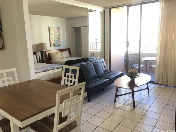 a living room with furniture and a table
