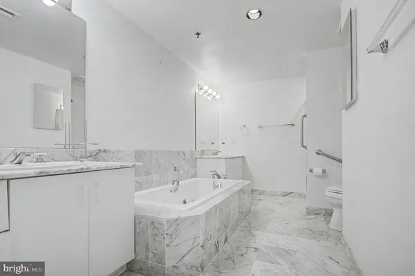 a view of a living room and dining room