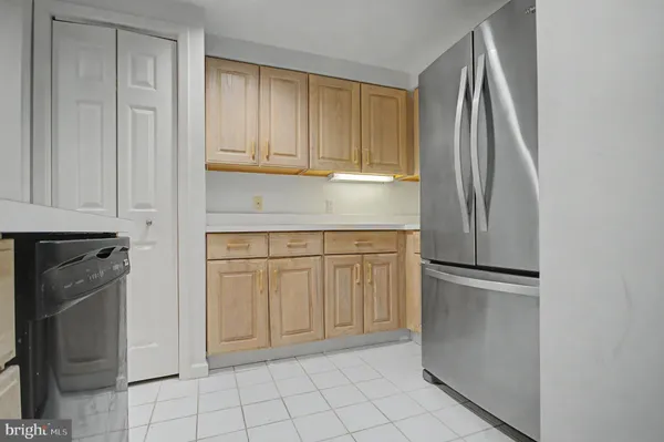 a view of a swimming pool with outdoor seating