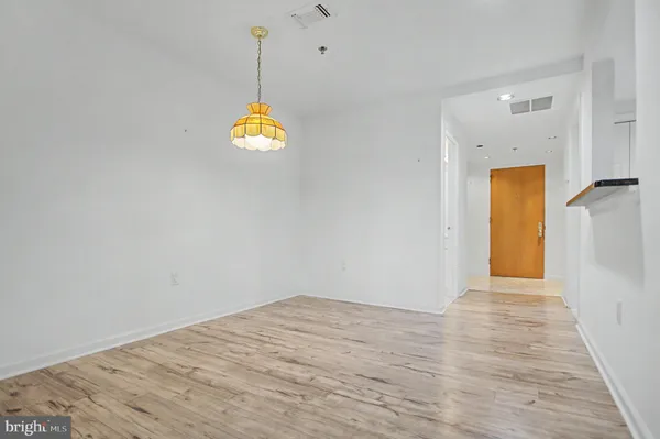 an outdoor patio with swimming pool and outdoor seating