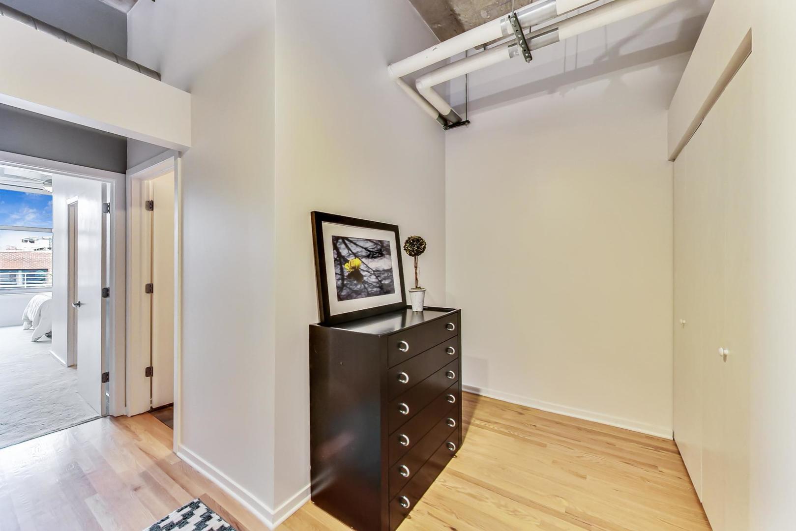 933 West Van Buren Street, Unit 903 Chicago, IL 60607 - Photo 35 of 50 a building outdoor space with patio furniture