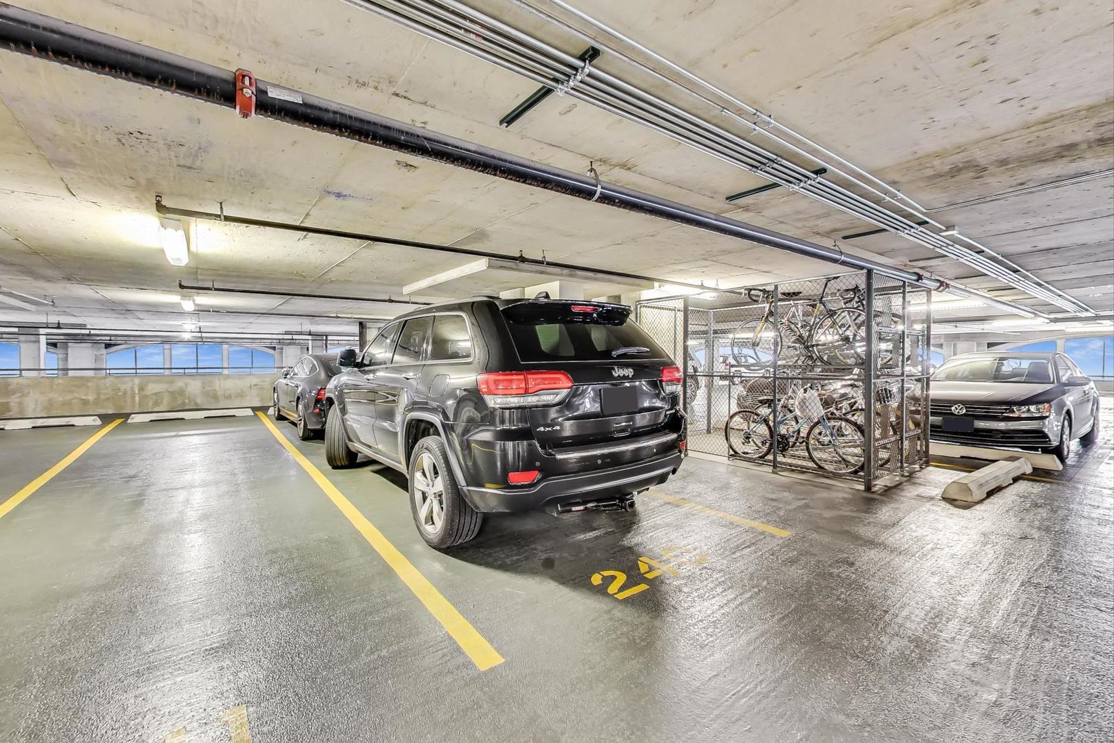 933 West Van Buren Street, Unit 903 Chicago, IL 60607 - Photo 41 of 50 a view of parking garage with cars