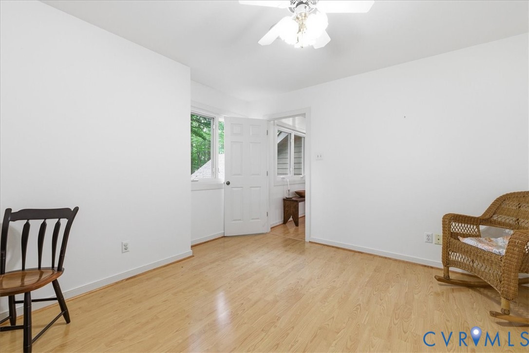 4099 Doe Run Road Hopewell, VA 23860 - Photo 28 of 36 Bright room featuring wood-finish flooring, white