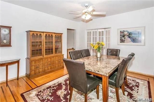 a kitchen with a white cabinets and stove