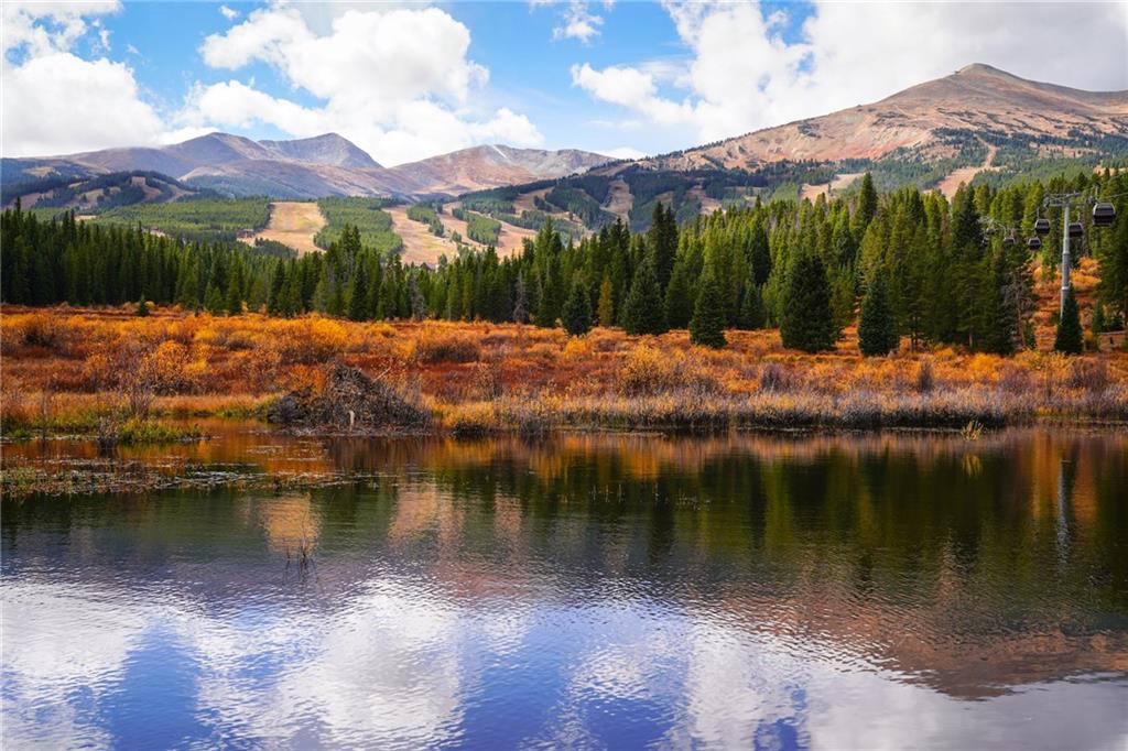 202 Cucumber Creek Road Breckenridge, CO 80424 - Photo 13 of 28 a view of a lake with a mountain in the background