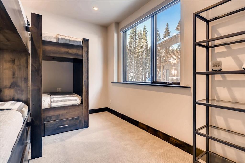 202 Cucumber Creek Road Breckenridge, CO 80424 - Photo 19 of 28 view of hall way with furniture