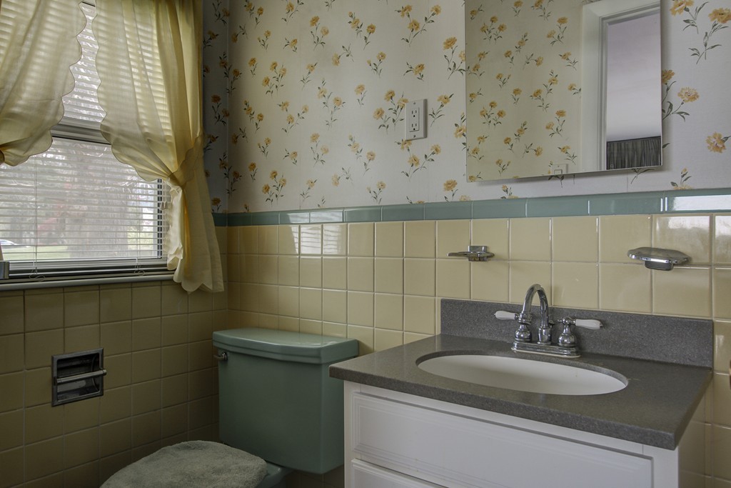 55 Tomahawk Road Arlington, MA 02474 - Photo 14 of 22 a bathroom with a sink and a toilet