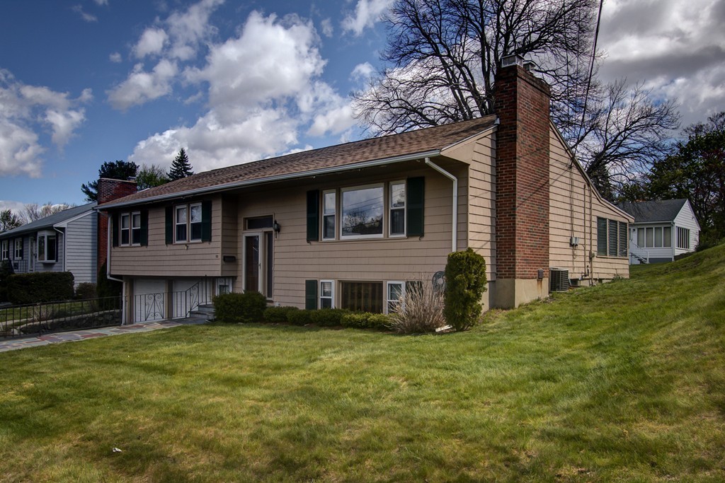 55 Tomahawk Road Arlington, MA 02474 - Photo 22 of 22 a view of house with yard and entertaining space