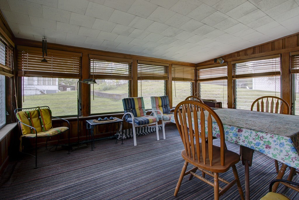 55 Tomahawk Road Arlington, MA 02474 - Photo 5 of 22 a view of a dining room with furniture window and outside view
