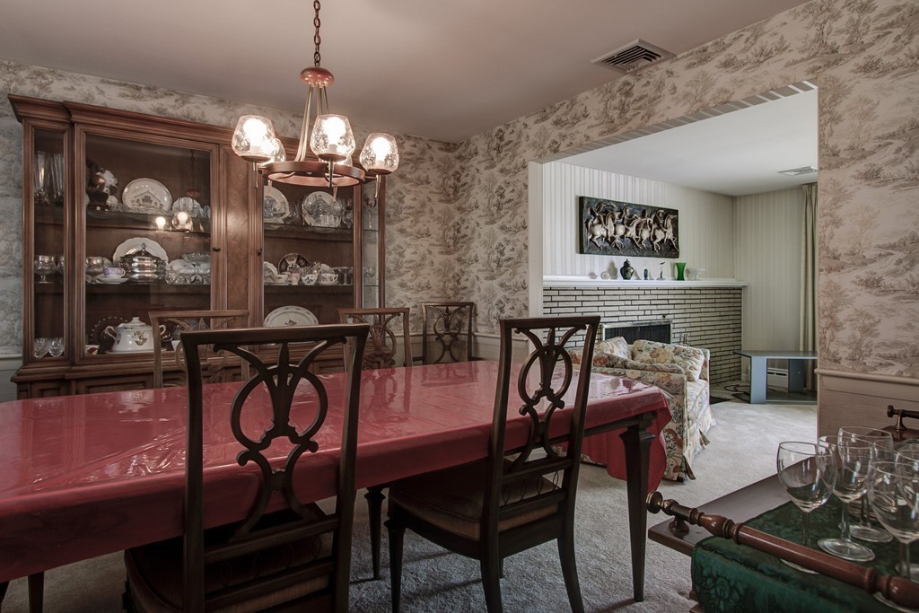 55 Tomahawk Road Arlington, MA 02474 - Photo 9 of 22 a view of a dining room with furniture window and outside view