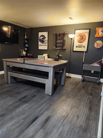 a view of a workspace with furniture