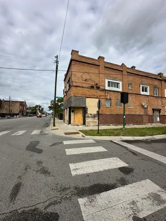 a view of a building with a street
