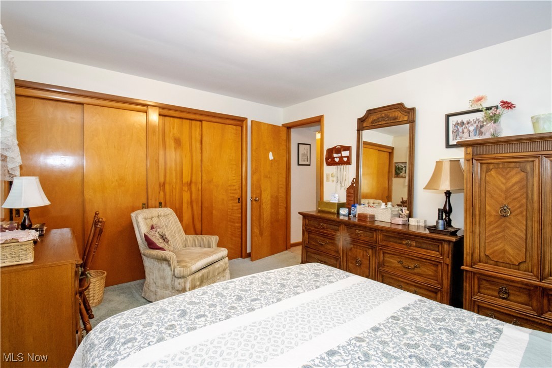 912 Ridgecrest Drive Wooster, OH 44691 - Photo 8 of 27 Carpeted bedroom featuring a closet