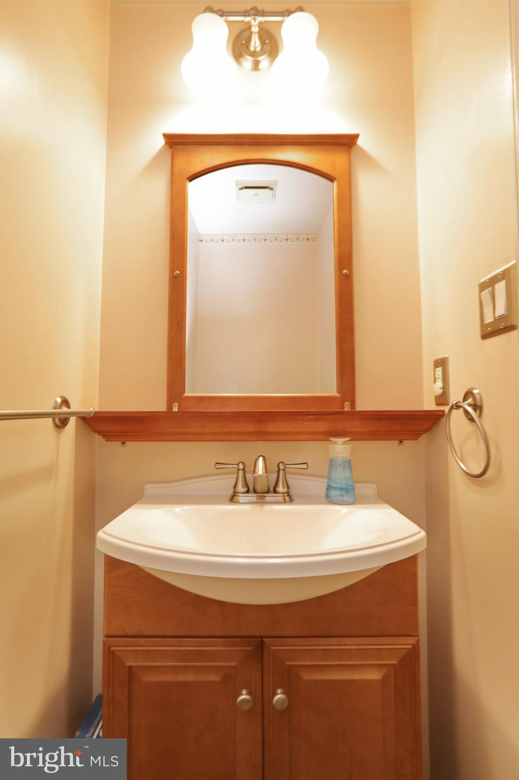 9154 Preference Drive La Plata, MD 20646 - Photo 13 of 65 Half-bath between kitchen and garage