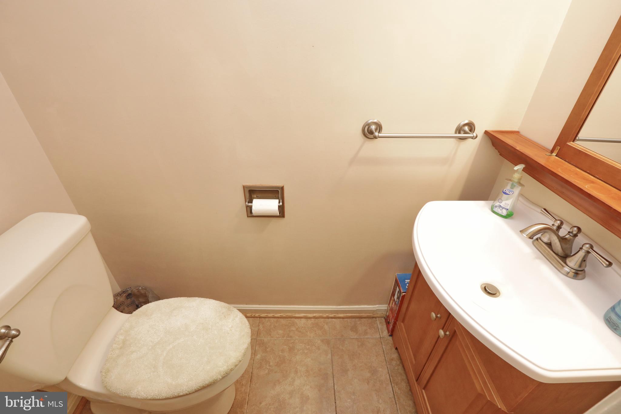 9154 Preference Drive La Plata, MD 20646 - Photo 14 of 65 Half bath between kitchen and garage