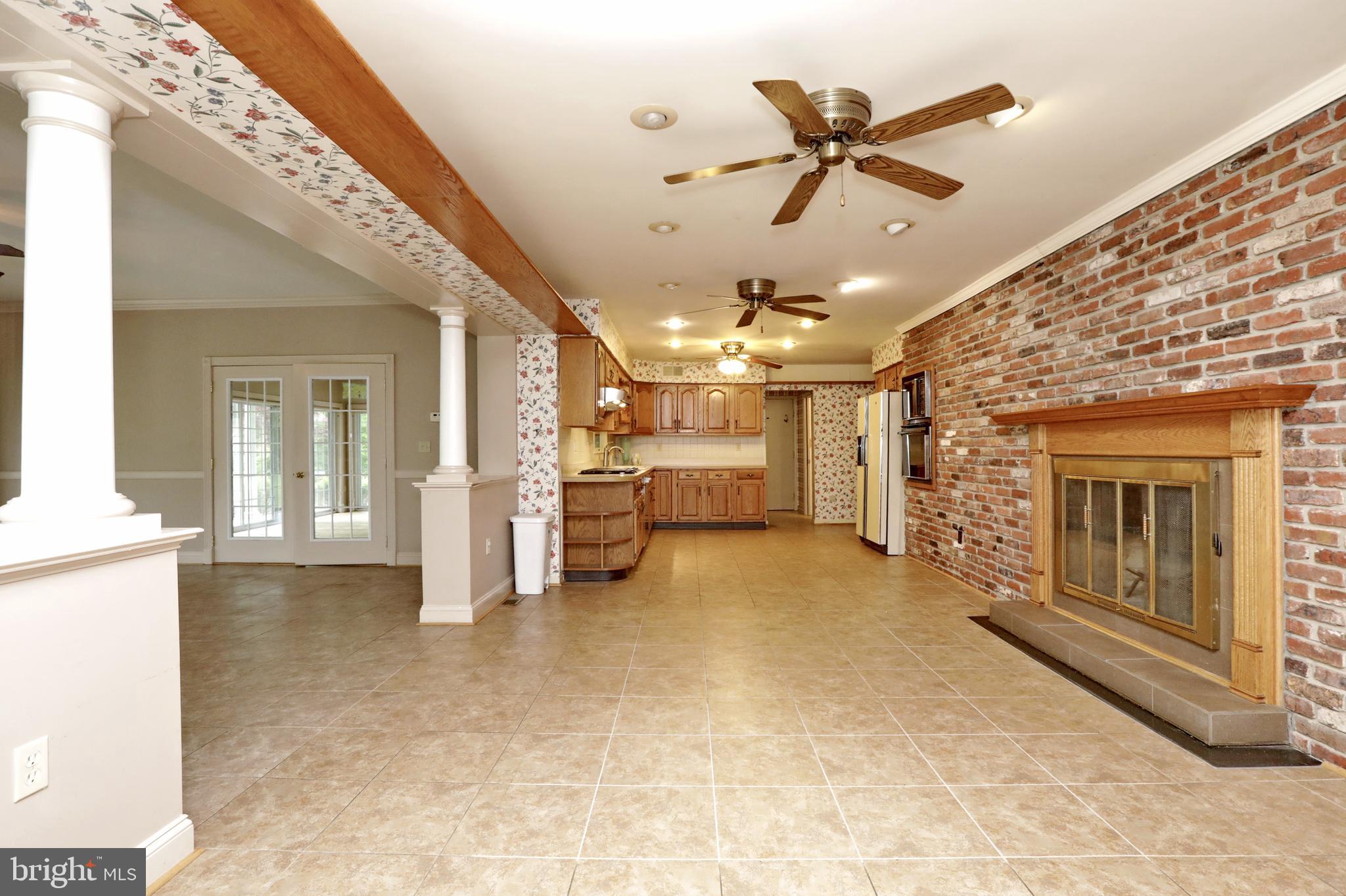 9154 Preference Drive La Plata, MD 20646 - Photo 24 of 65 Eat-in kitchen w/fireplace leading to family room