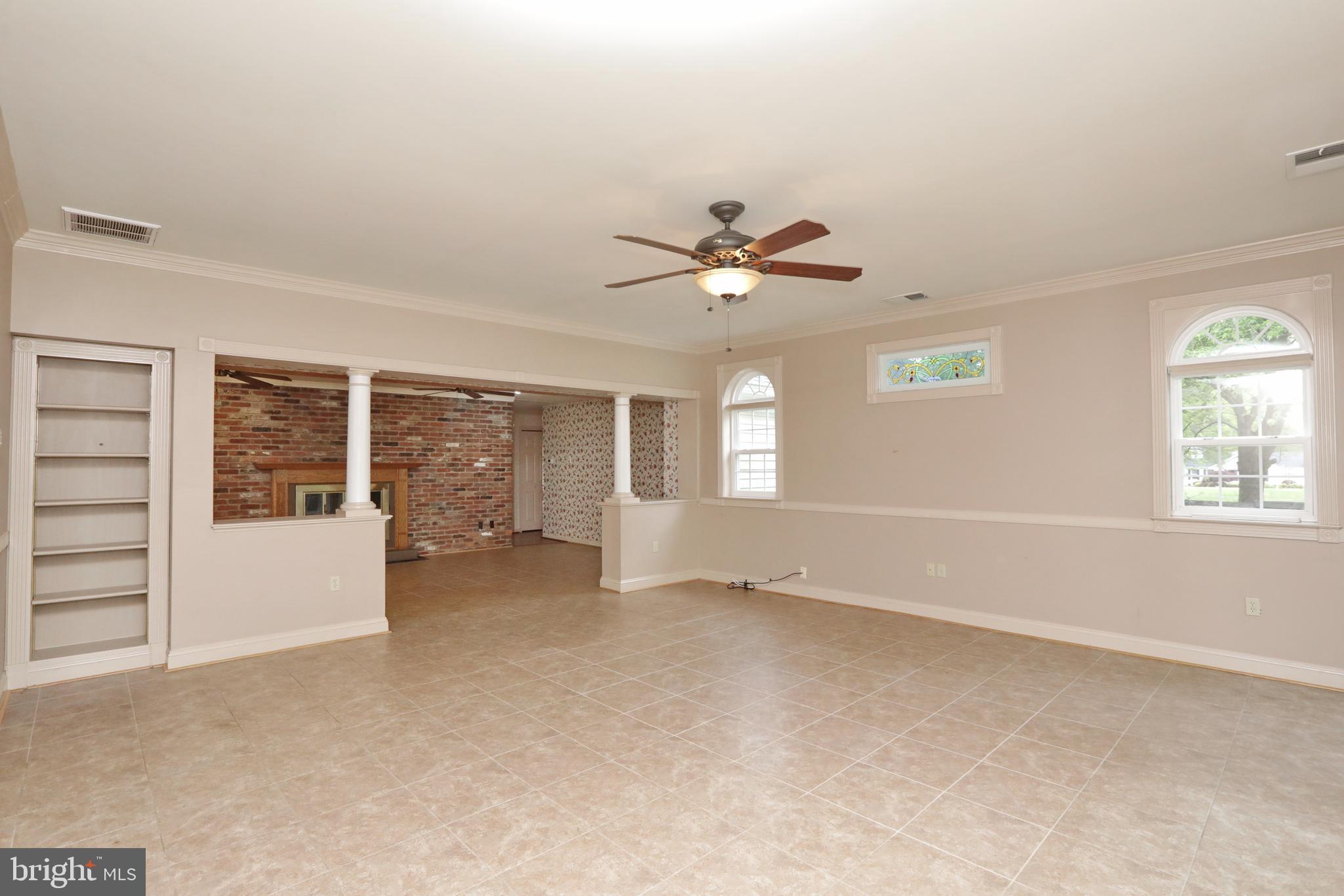 9154 Preference Drive La Plata, MD 20646 - Photo 27 of 65 Fam. rm. w/ built-in bookcase / stained glass win.