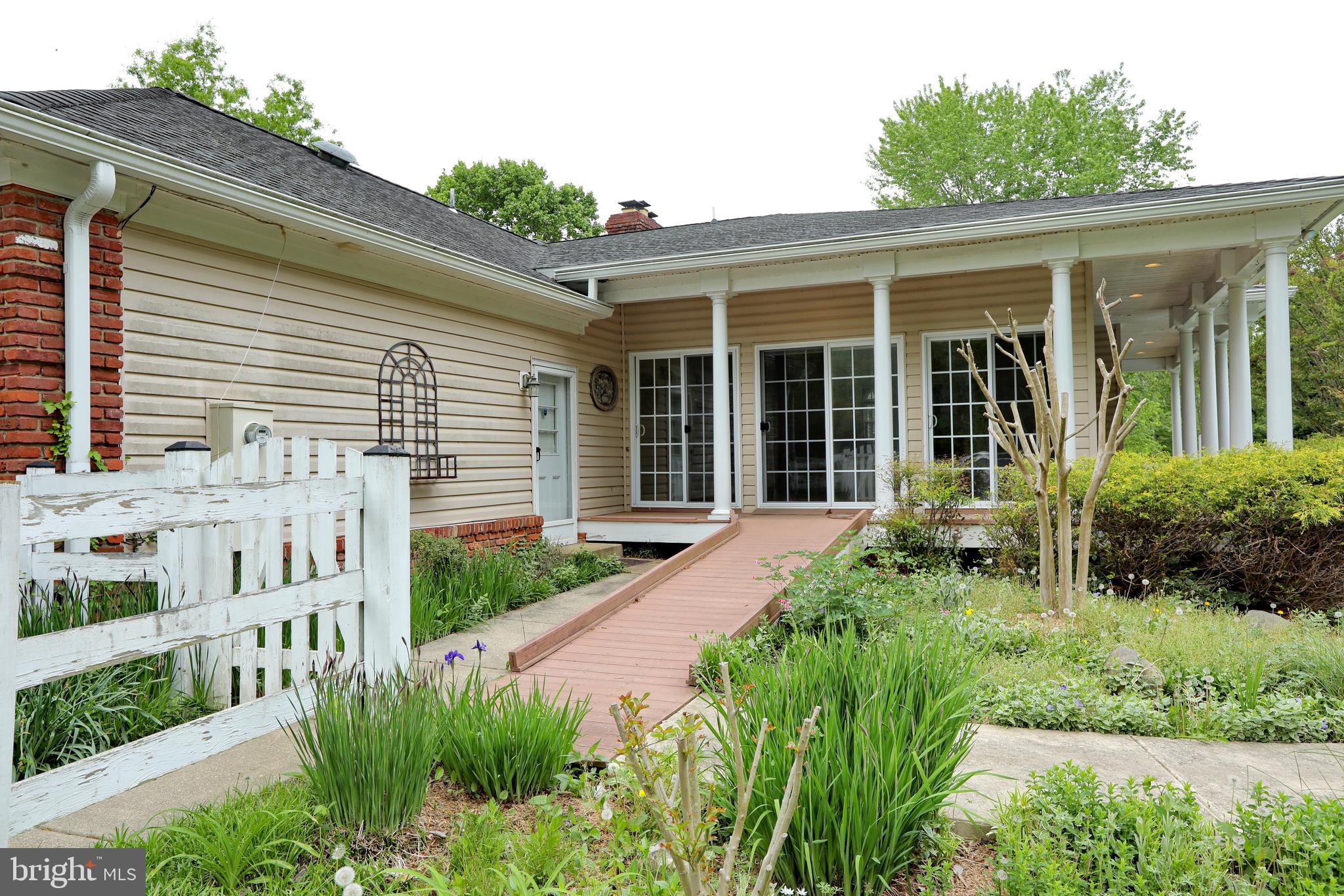 9154 Preference Drive La Plata, MD 20646 - Photo 54 of 65 Side entrance to sun room and garage