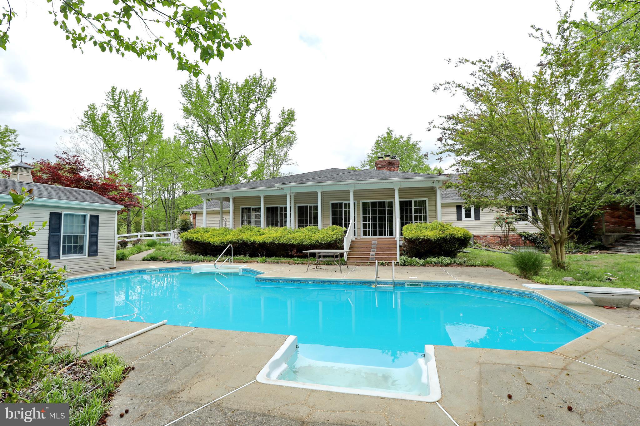 9154 Preference Drive La Plata, MD 20646 - Photo 58 of 65 Back of home with pool