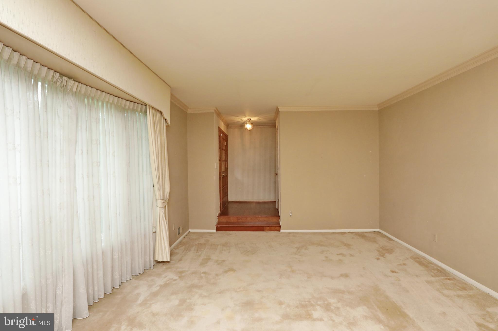 9154 Preference Drive La Plata, MD 20646 - Photo 10 of 65 Steps from foyer leading to formal living room