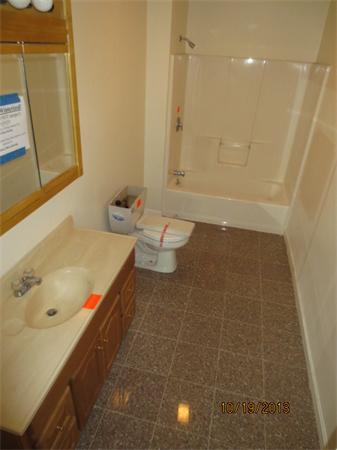 35 Houghton Street Worcester, MA 01604 - Photo 15 of 22 a bathroom with a tub sink and toilet