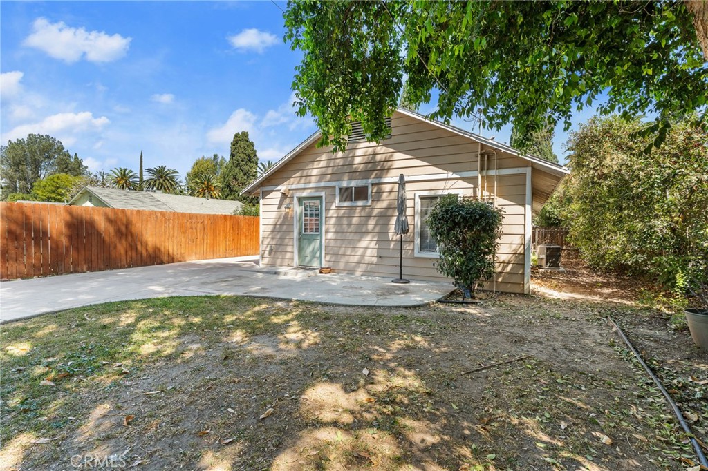 4390 Edgewood Place Riverside, CA 92506 - Photo 21 of 32 a view of a house with pool