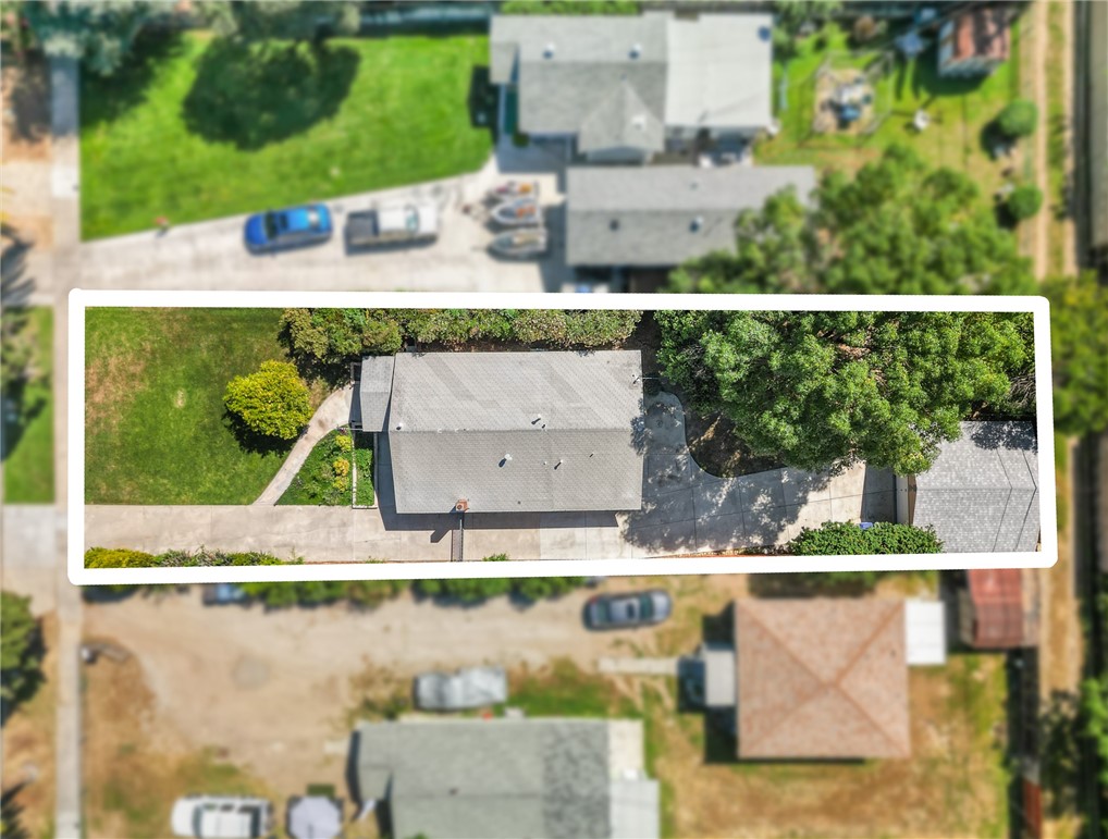 4390 Edgewood Place Riverside, CA 92506 - Photo 27 of 32 an aerial view of a house with yard swimming pool and outdoor seating