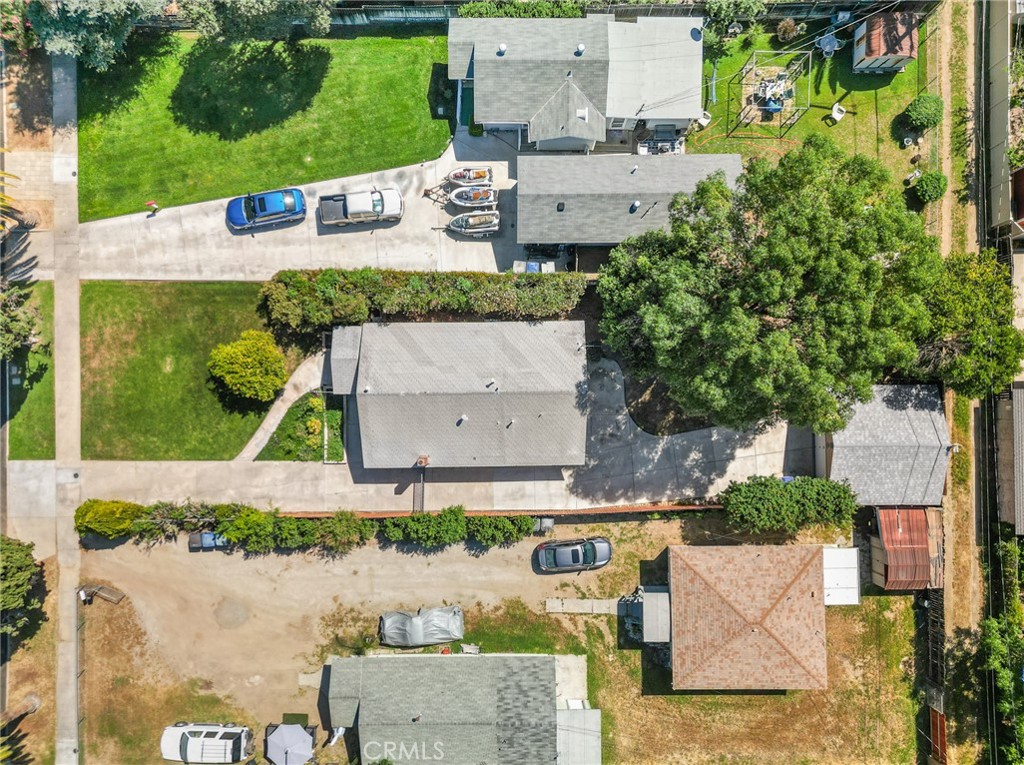 4390 Edgewood Place Riverside, CA 92506 - Photo 28 of 32 an aerial view of a house with a garden and street