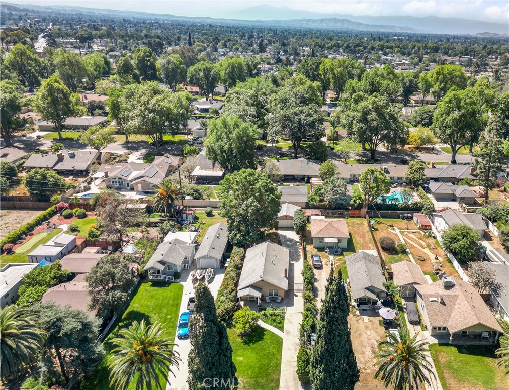 4390 Edgewood Place Riverside, CA 92506 - Photo 31 of 32 an aerial view of residential houses with outdoor space