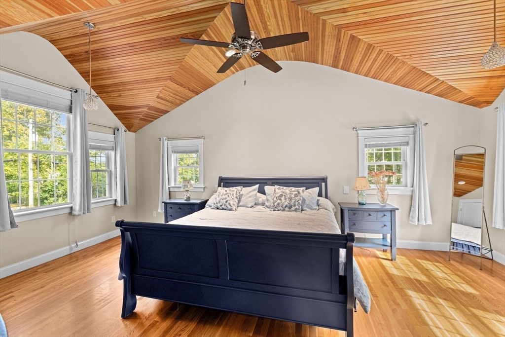 355 Tilden Road Scituate, MA 02066 - Photo 28 of 42 a bed sitting in a bedroom next to a window