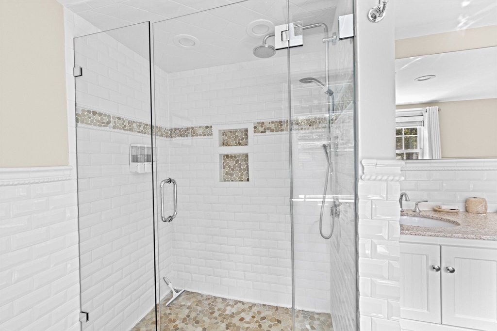 355 Tilden Road Scituate, MA 02066 - Photo 32 of 42 a bathroom with a shower and a sink
