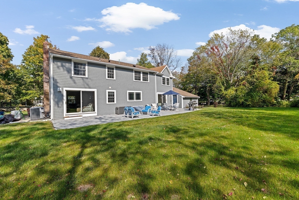 355 Tilden Road Scituate, MA 02066 - Photo 35 of 42 a front view of a house with a garden
