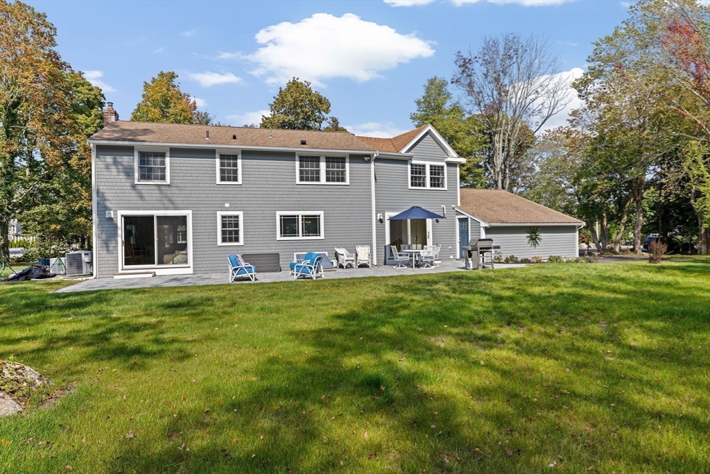 355 Tilden Road Scituate, MA 02066 - Photo 36 of 42 a front view of house with yard and green space